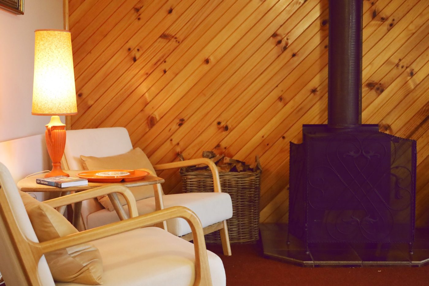 Living room at dusk with log burner